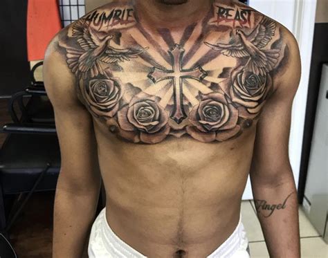 If you already have a few <strong>tattoos</strong> and have some negative space in between them, add on to them to make them blend into one another more cleanly. . Dope chest tattoos